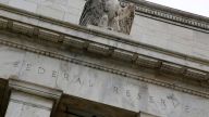 A new Fed Beige Book report shows the economy has been growing but has been slowed by several factors.