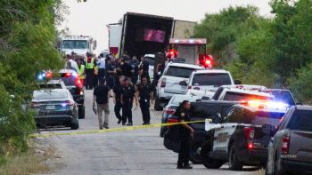 Dozens of migrants died in San Antonio after being stuck in a tractor-trailer.