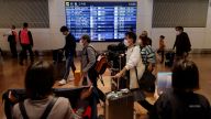 As health experts warned of a new COVID-19 wave in Europe, officials in Japan and Taiwan lifted restrictions on foreign travelers.