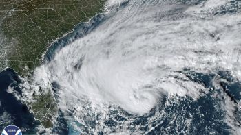 Remnants from the former Hurricane Nicole, now a tropical depression, dropped rain from Georgia to New York Friday.