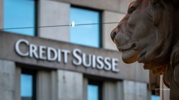 Days after two U.S. banks failed, a Swiss bank is now in crisis: Credit Suisse shares sank as much as 30% Wednesday, hitting a record low.