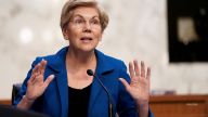 U.S. Senator Elizabeth Warren (D-MA) gestures as Federal Reserve Chair Jerome Powell testifies before a Senate Banking, Housing, and Urban Affairs Committee hearing on the "Semiannual Monetary Policy Report to the Congress", on Capitol Hill in Washington, D.C., U.S., June 22, 2022. REUTERS/Elizabeth Frantz